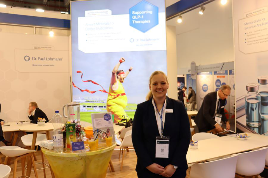 Hericks in suit with tables in background